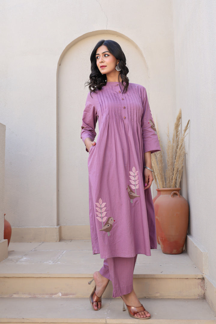 Mauve kurta set with bird motifs