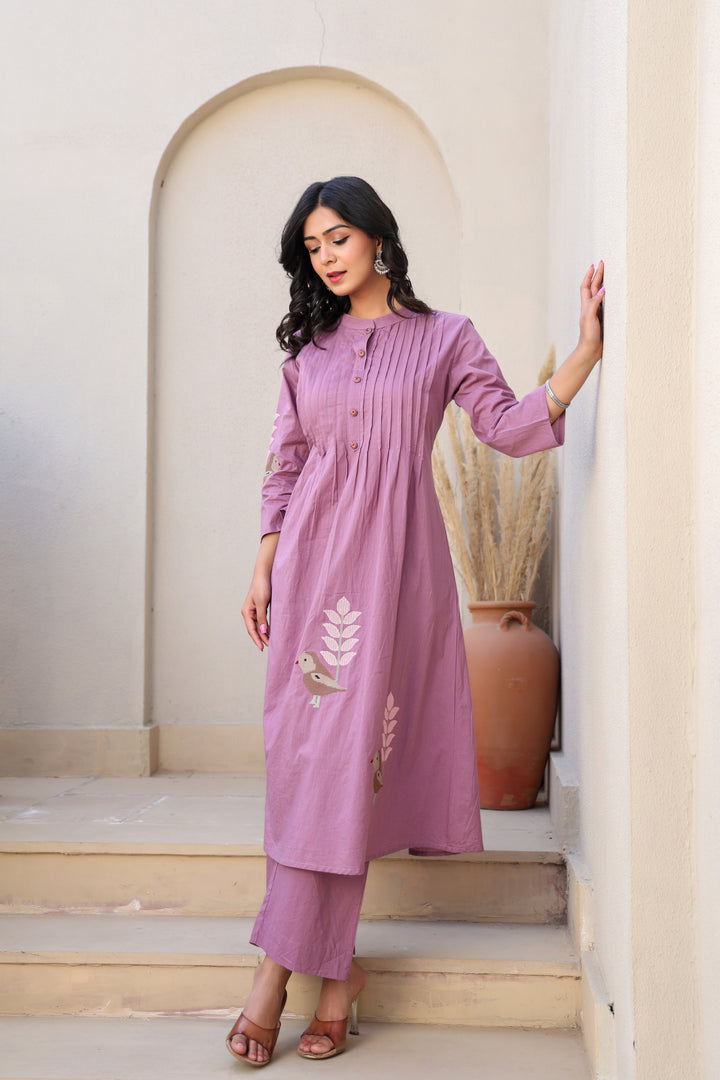 Mauve kurta set with bird motifs