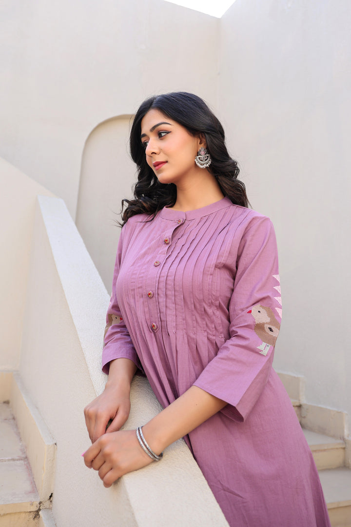 Mauve kurta set with bird motifs
