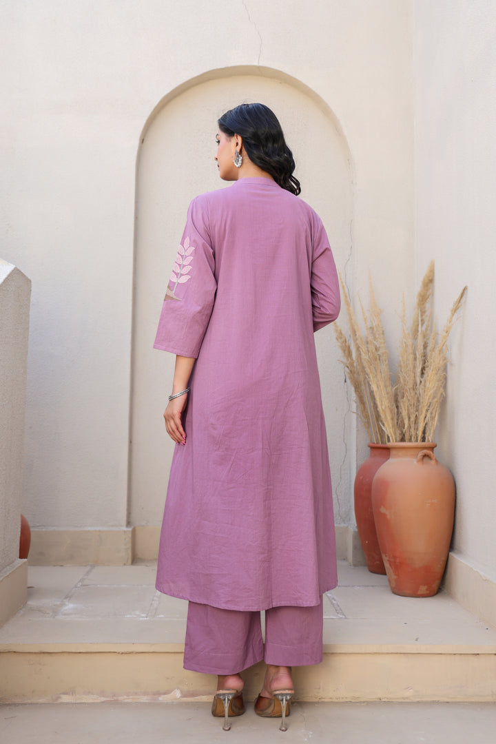 Mauve kurta set with bird motifs