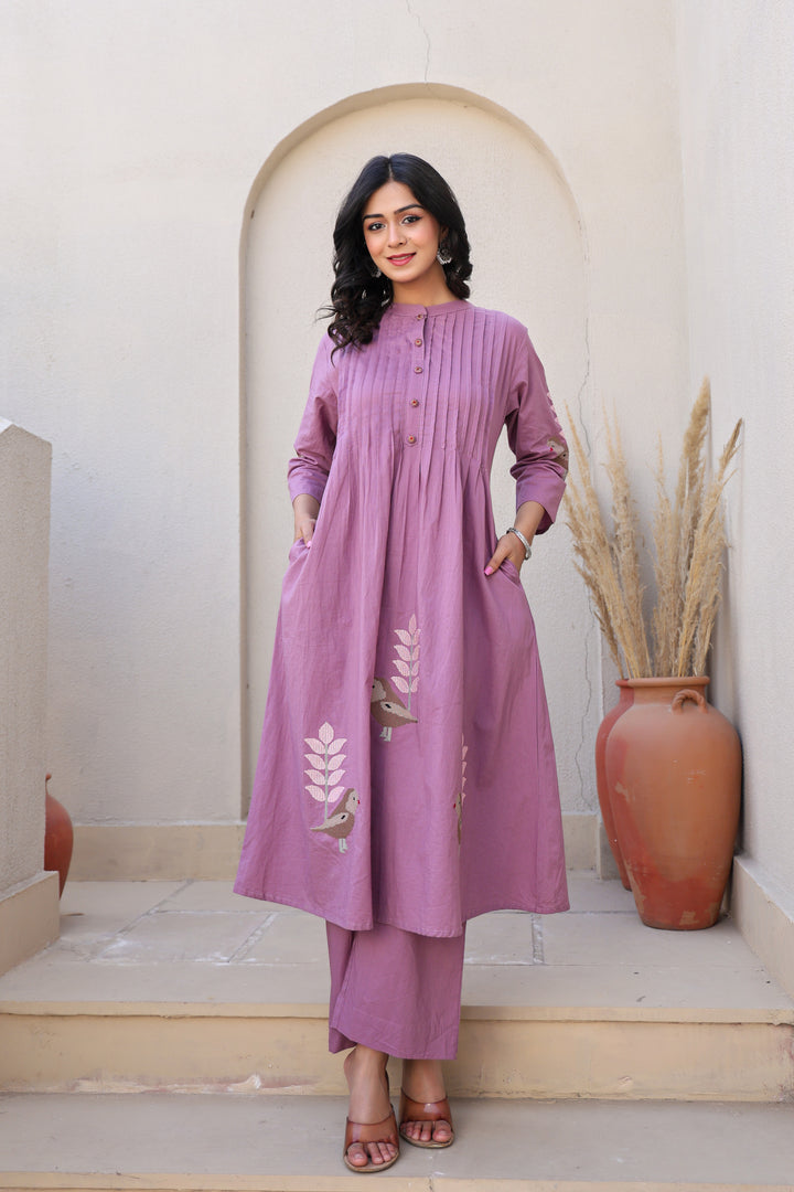Mauve kurta set with bird motifs