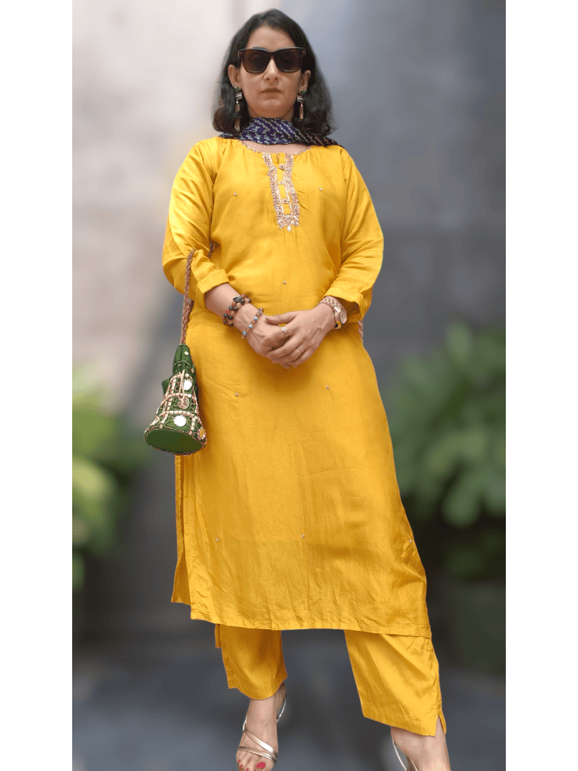 Dola silk suit with Gaji silk dupatta.
