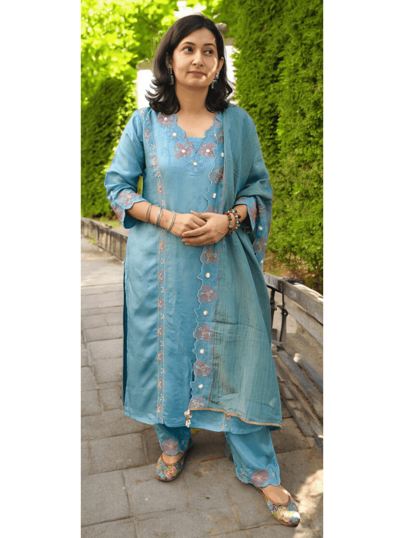 Dola silk suit paired with a tissue dupatta