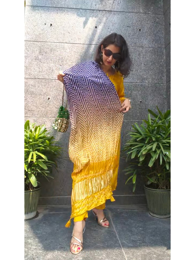 Dola silk suit with Gaji silk dupatta.