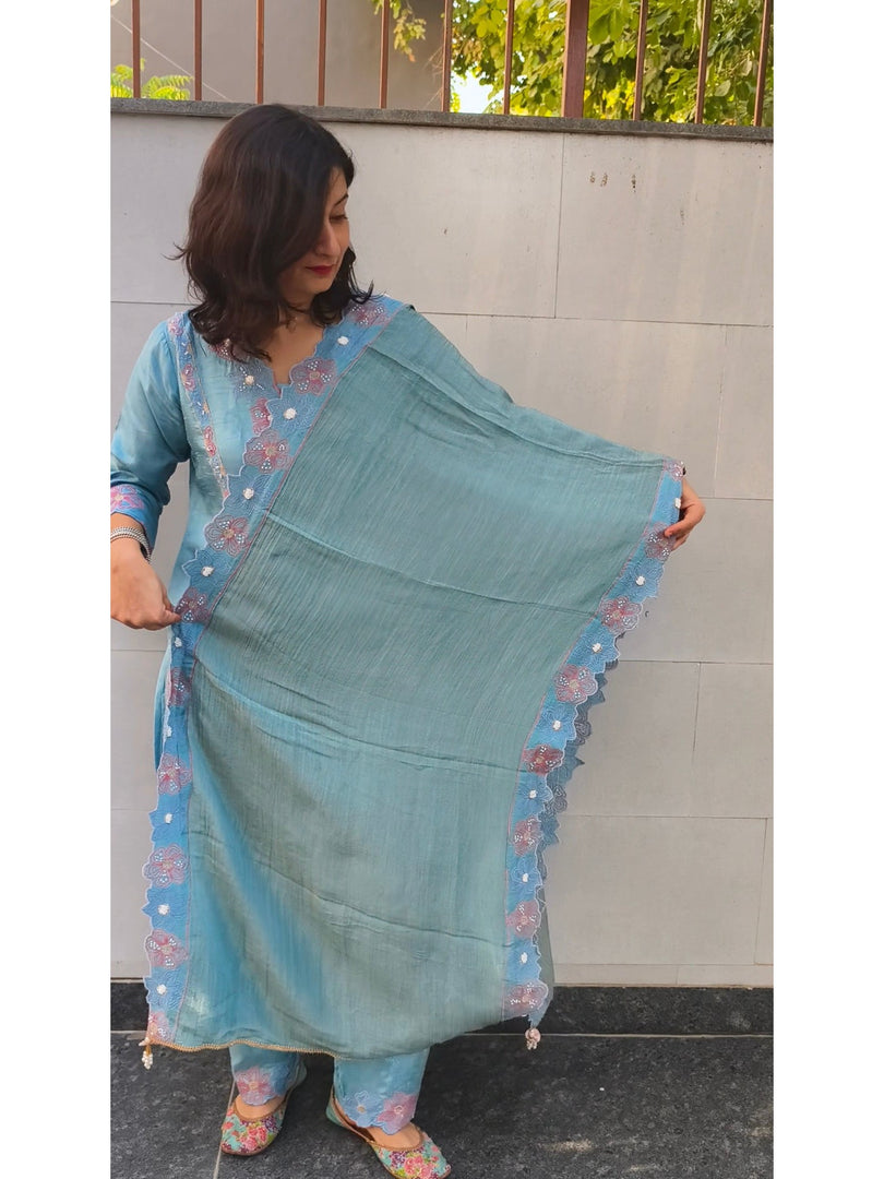 Dola silk suit paired with a tissue dupatta