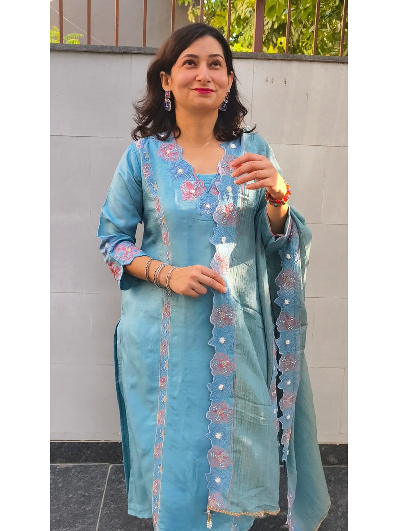 Dola silk suit paired with a tissue dupatta