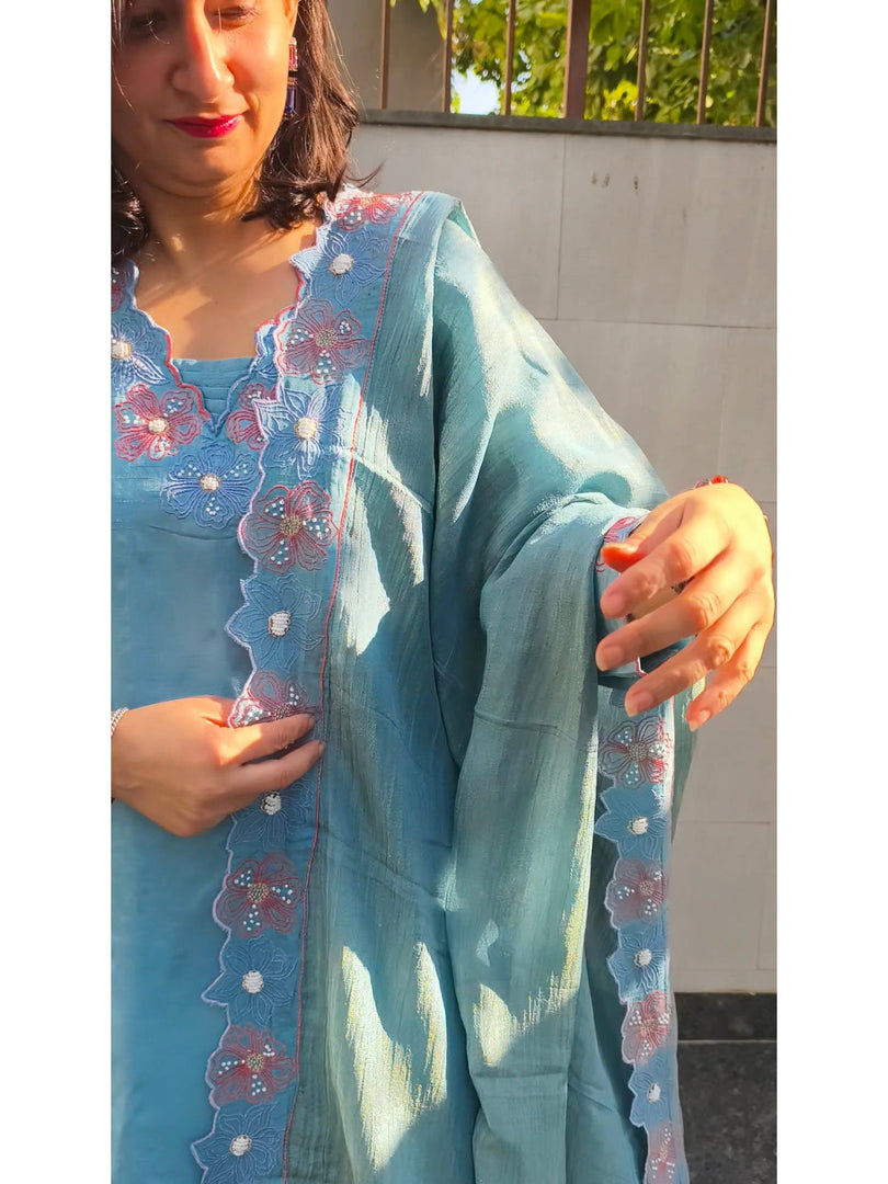 Dola silk suit paired with a tissue dupatta